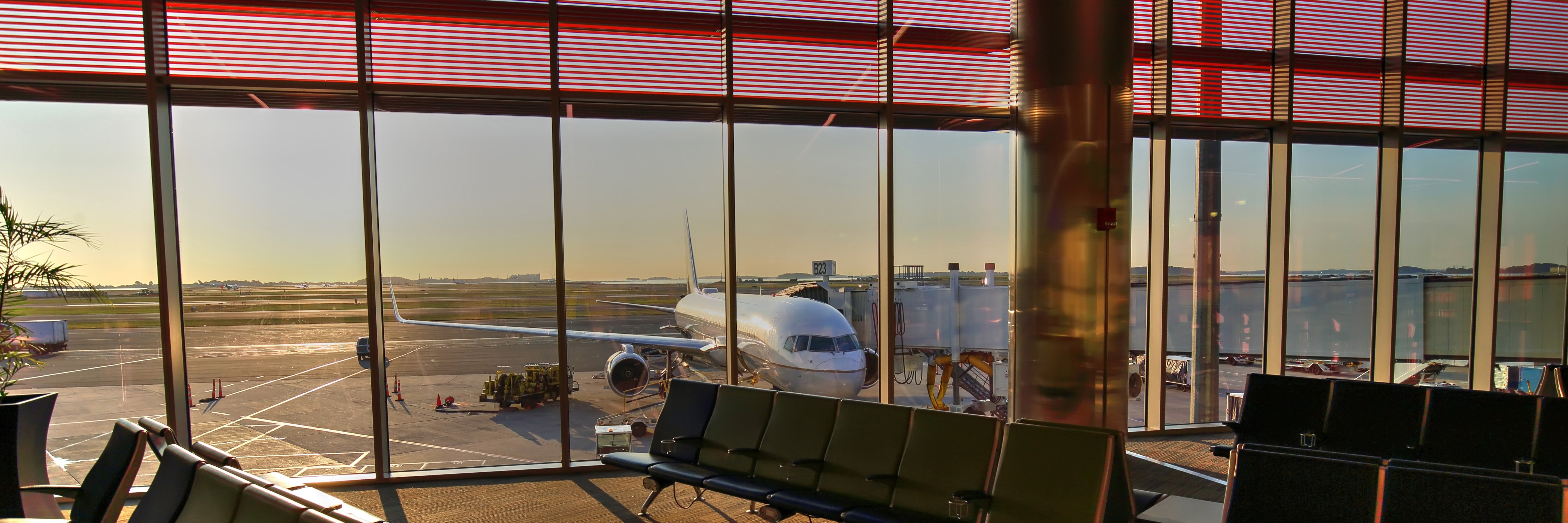 Airport waiting area with Sunrise in background